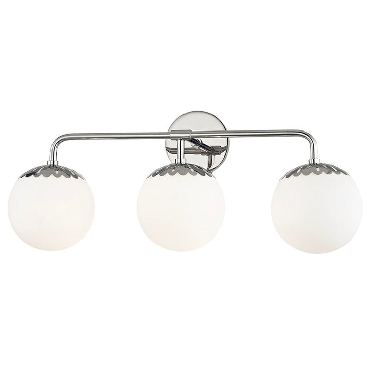 Adelaide 3 light wall sconce in a polish nickel finish. White glass globe sconce in a polished nickel finish, meant for a bathroom vanity.