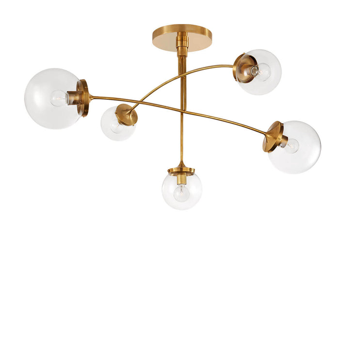 The Prescott Mobile Chandelier has 5 clear glass globe shaped shades and soft brass rods in a solar system diorama shape.