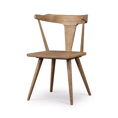 Modern dining chair with a rounded back, angled legs in a light oak finish.