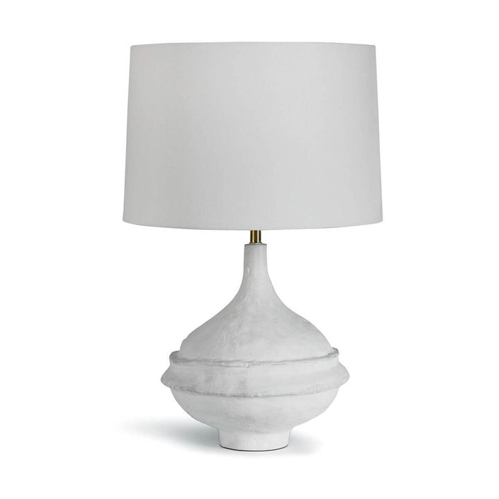 The Couronne Table Lamp has an interesting, matte white paper mache base with unique texture.