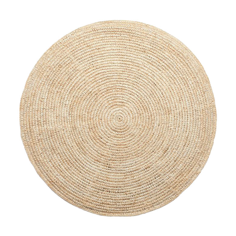 The Hawaii Wall Basket is a large round, flat woven wall basket made from neutral sisal fibres.