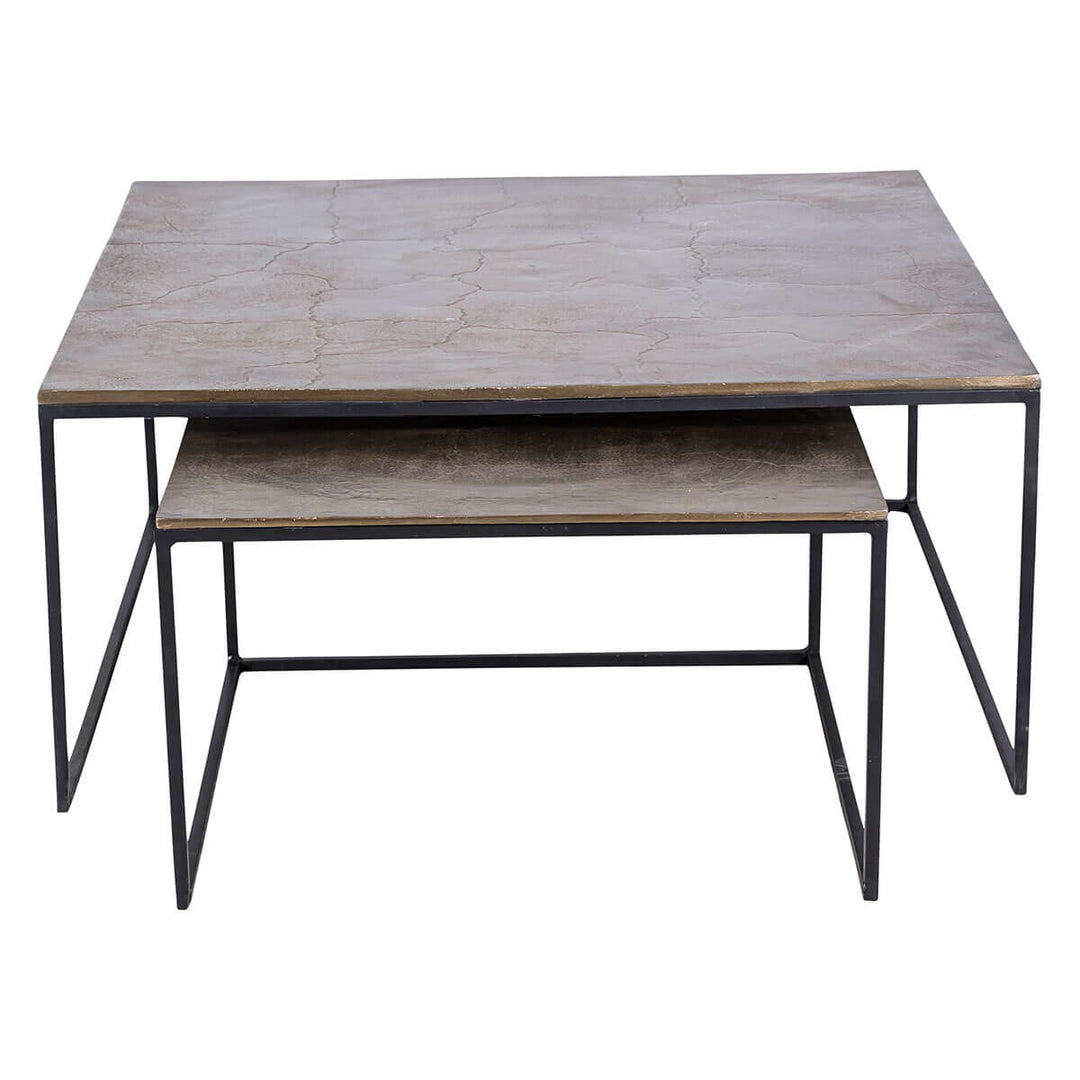 The Utica Nesting Coffee Tables has a matte black frame with an aluminum and iron top with an antique brass finish.
