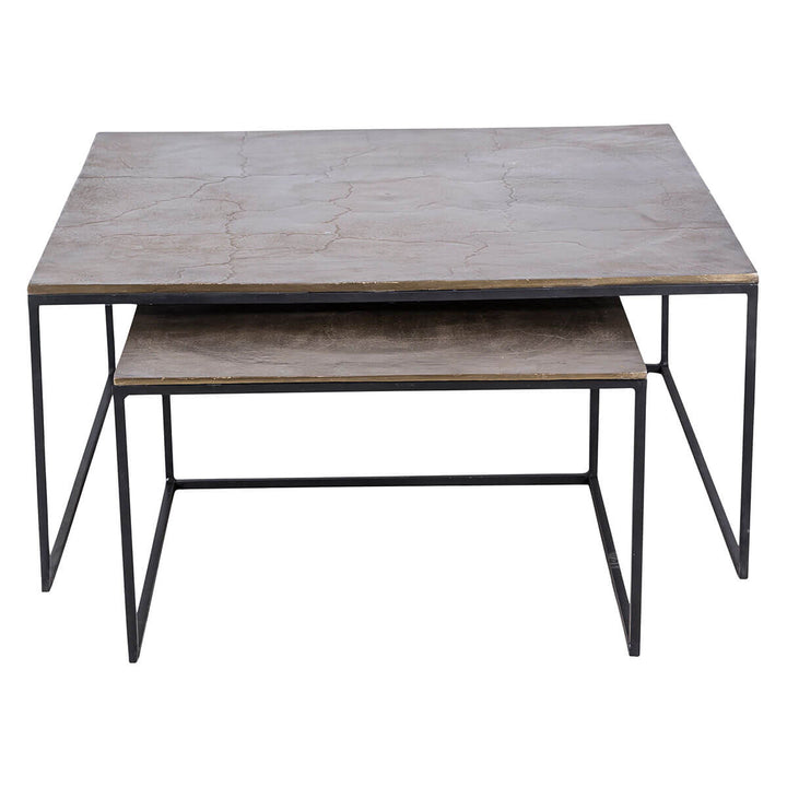 The Utica Nesting Coffee Tables has a matte black frame with an aluminum and iron top with an antique brass finish.