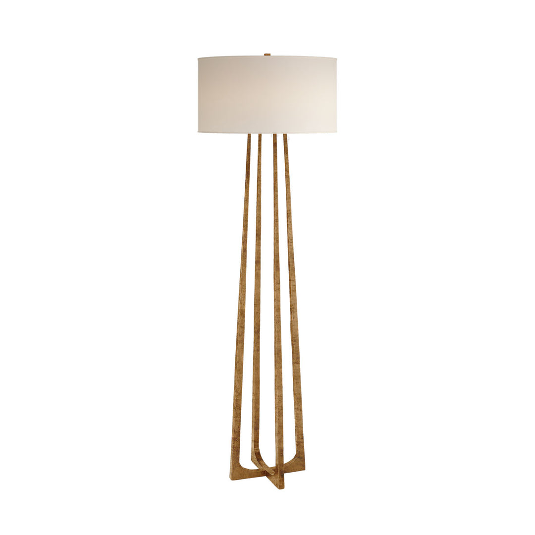 The Scala Floor Lamp has a hand-forged, iron column with a gilded iron finish and a natural percale shade.