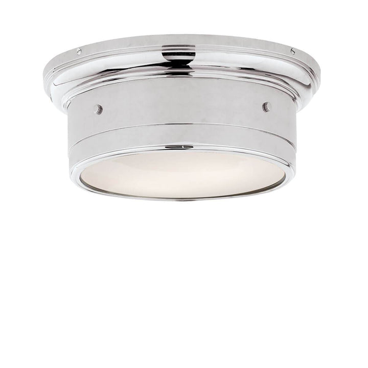 The Siena Flush Mount has a simple drum shape in a polished nickel finish with covered bolt details and a white glass diffuser