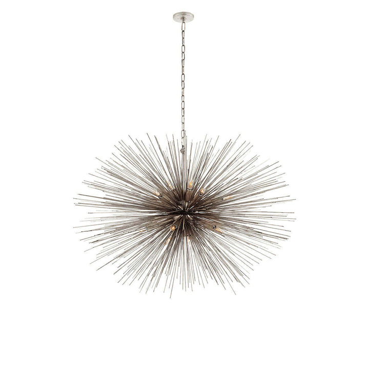 The Strada Oval Chandelier has twenty small lights hidden within the burnished silver leaf metal spike arms on the starburst pendant.