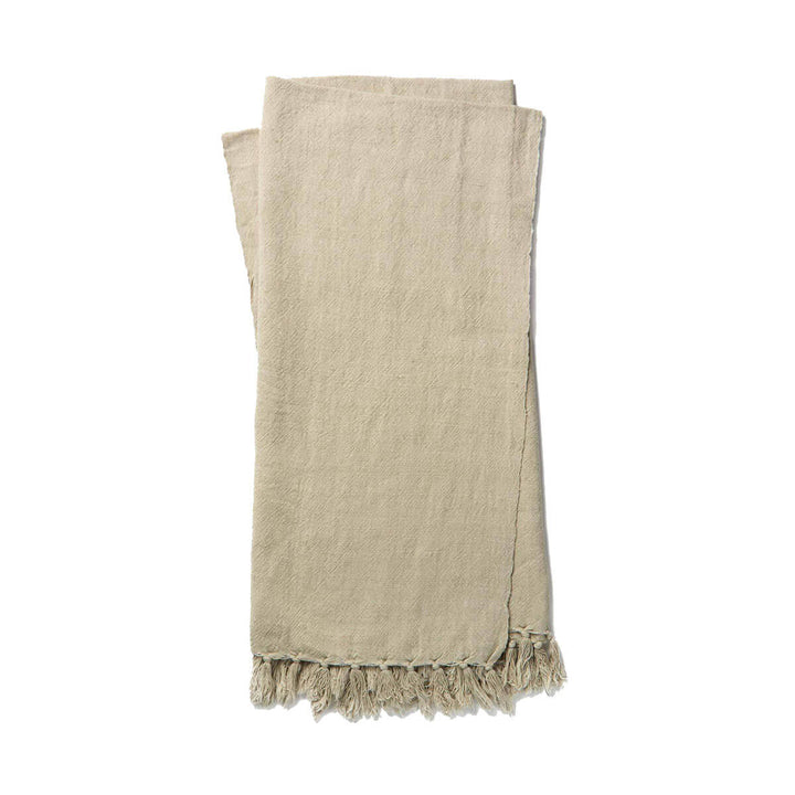 The Gobi Throw - Grey is a simple light grey coloured, cotton and linen blanket with a fringe edge.