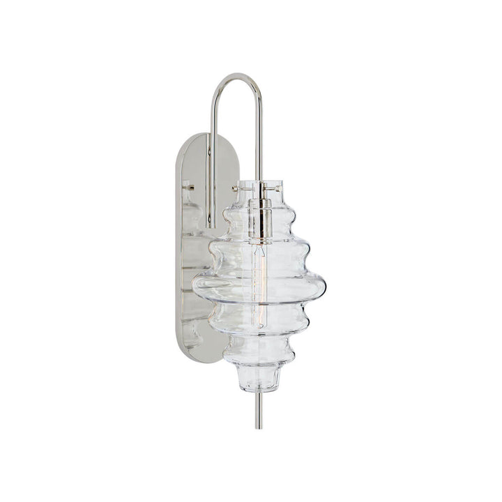 The Tableau Wall Sconce has a polished nickel backplate and hooked arm with a clear glass rippled lamp shade.