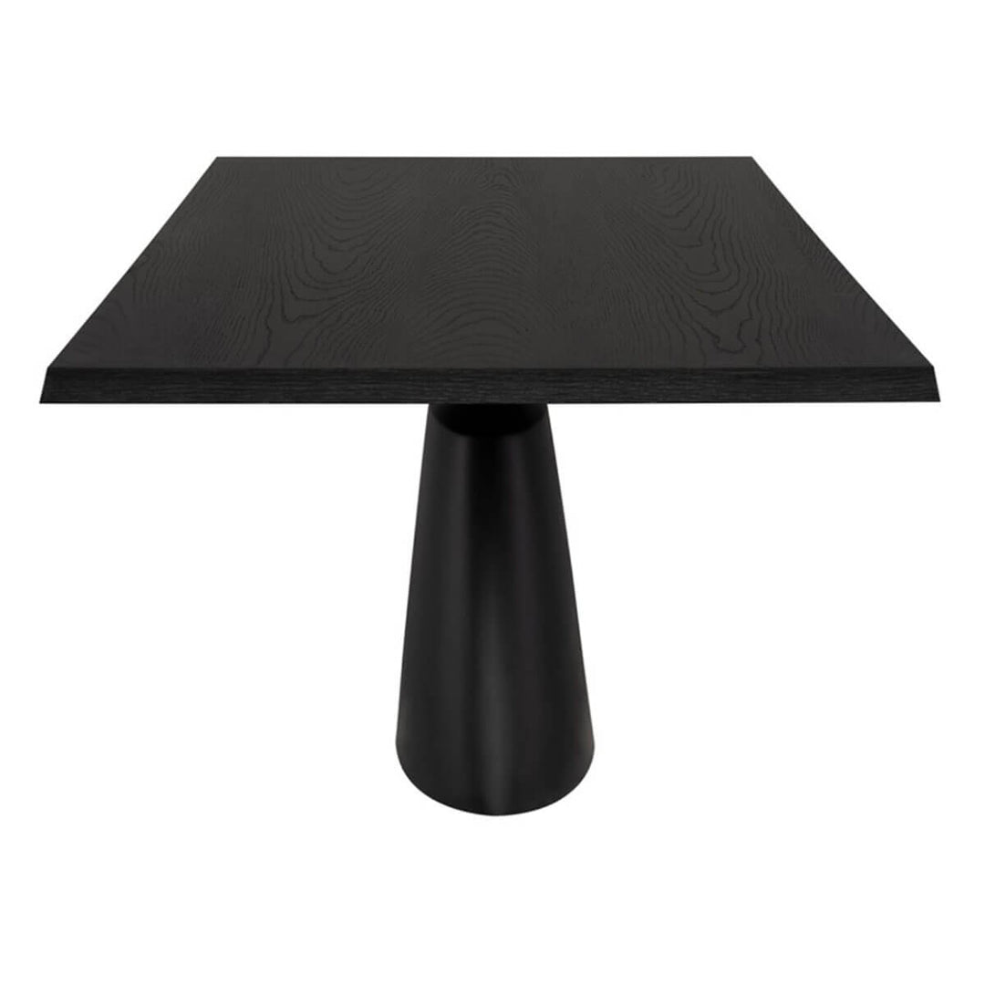 Side view of a black dining room table with a broad, floating tabletop and architectural base.