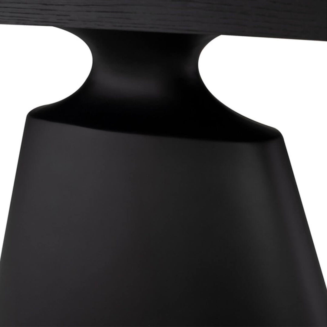 Sleek, stand-alone architectural base detail on dining table.