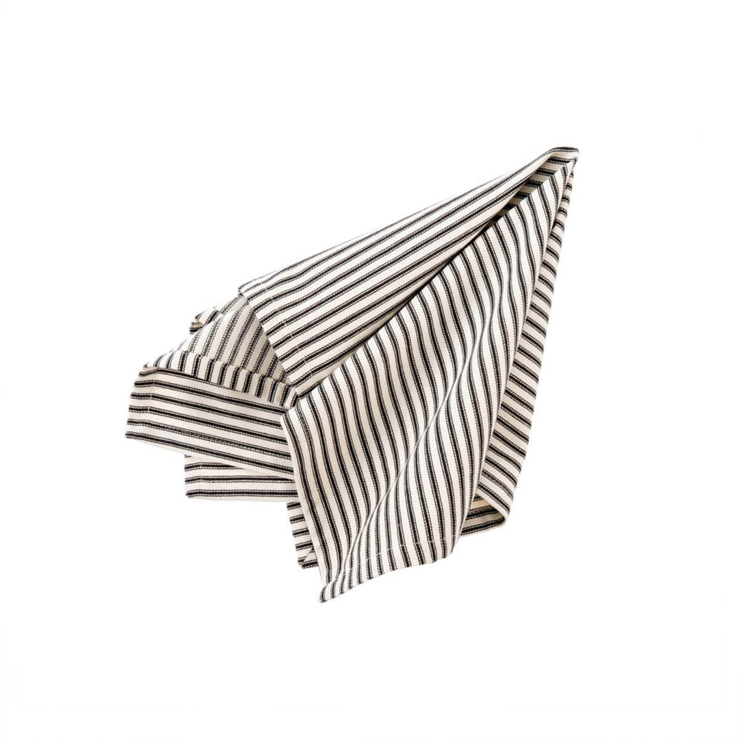 The Ticking Napkin - Black is a black and white striped, woven cotton napkin.