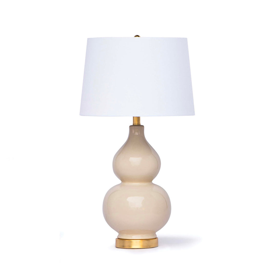 Ceramic table lamp with an ivory glaze and linen shade.