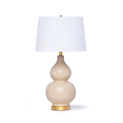 Ceramic table lamp with an ivory glaze and linen shade.