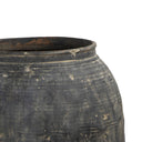Close up textural detail of antique one of a kind water pots from China.