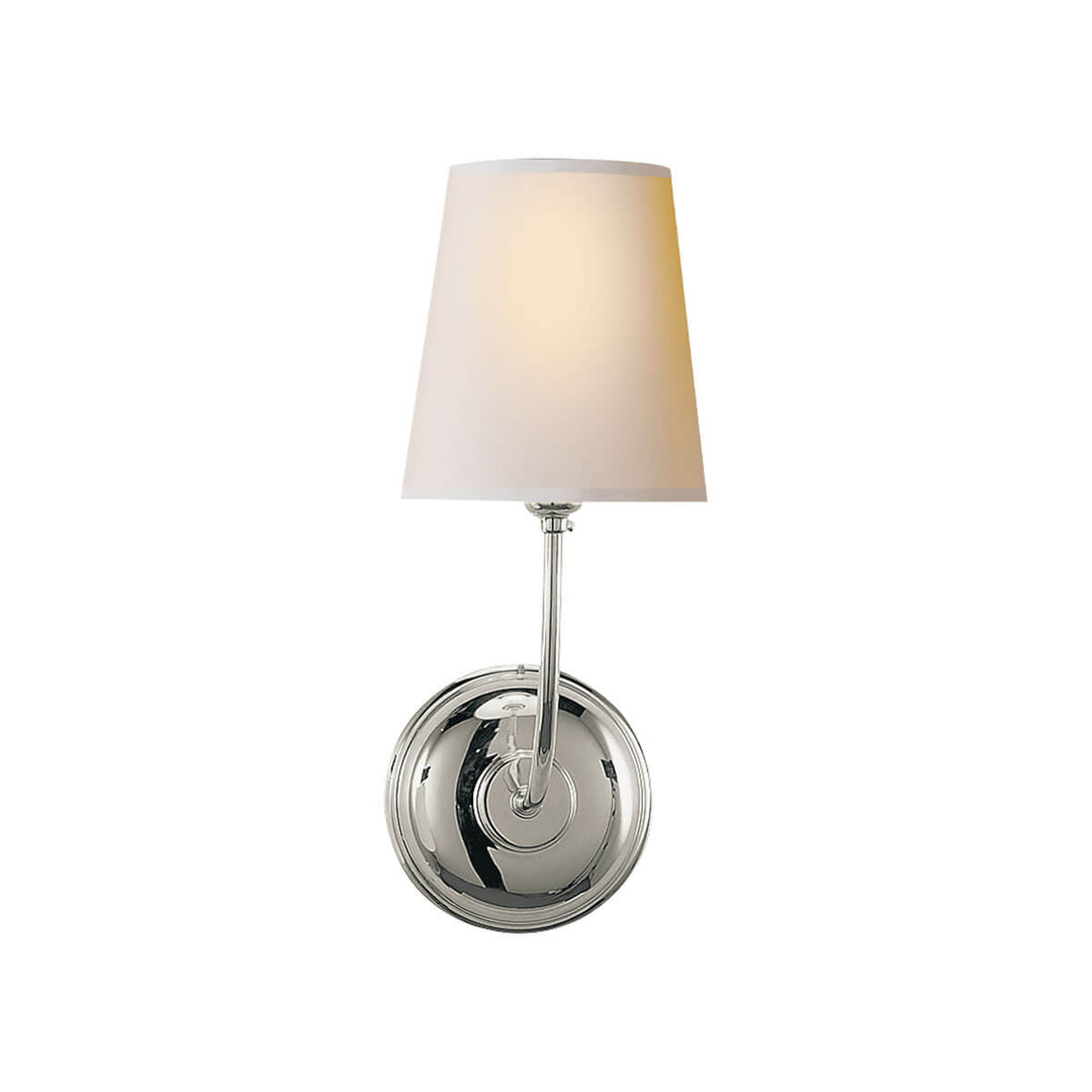 The Vendome Single Wall Sconce has a single natural paper shade with a round backplate and simple, curved arm in a polished nickel finish.