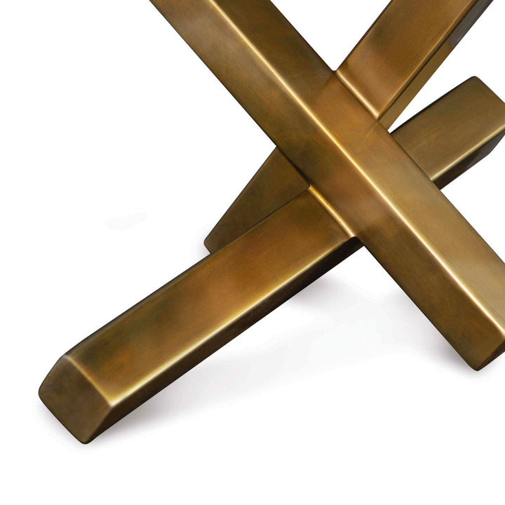 Base of a modern brass sculpture with intersecting forms.