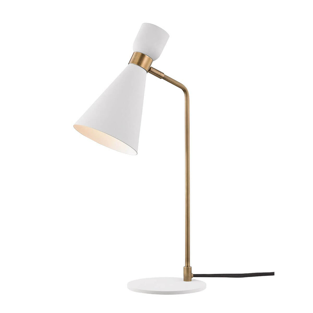 The Hudson Table Lamp in a matte white finish with burnished brass hardware.
