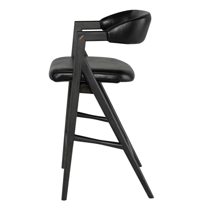 Black leather counter stool with curved back. Modern sleek design. Comfortable oak frame.