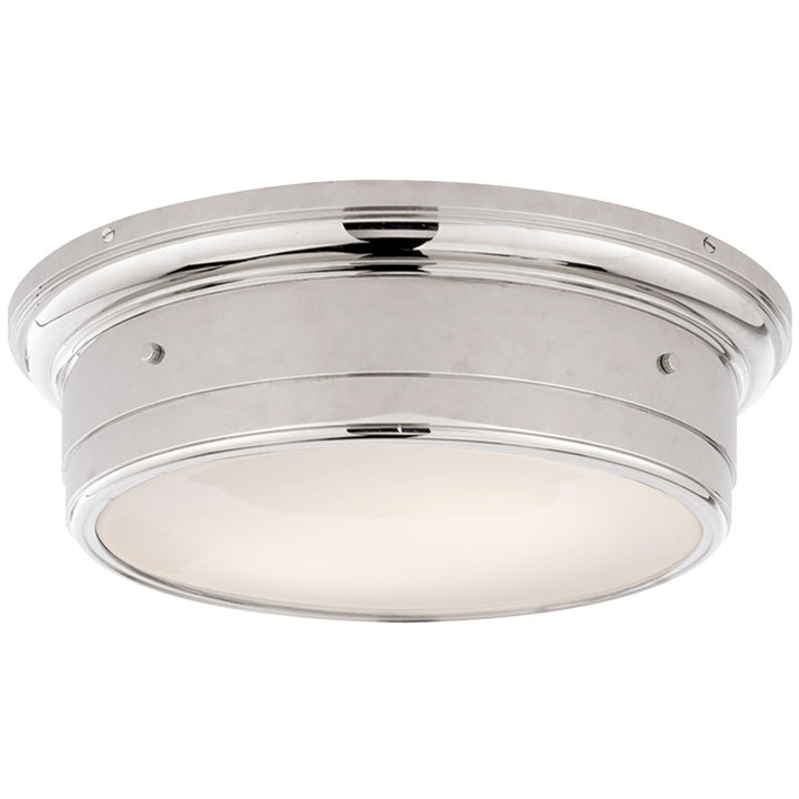 The Siena Flush Mount in Large has a simple drum shape in Chrome finish with covered bolt details and a white glass diffuser.